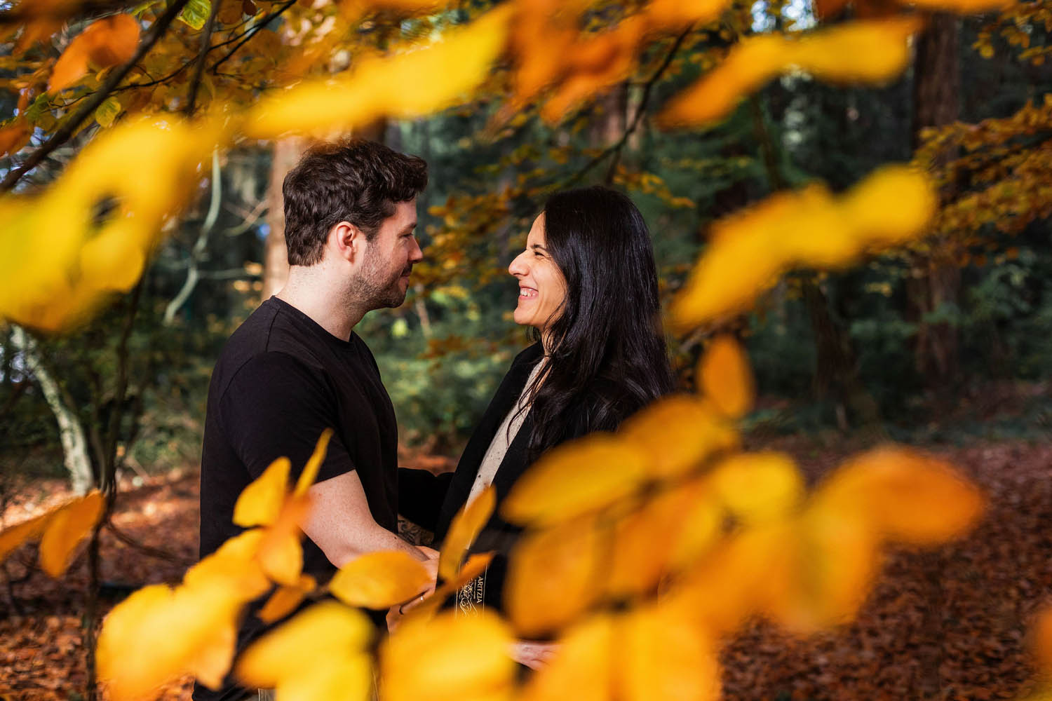 engagement session portraits under the autumn leaves