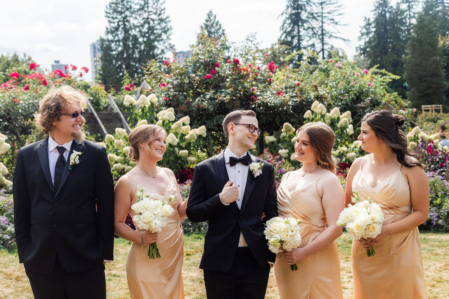 wedding party candids at rose garden stanley park