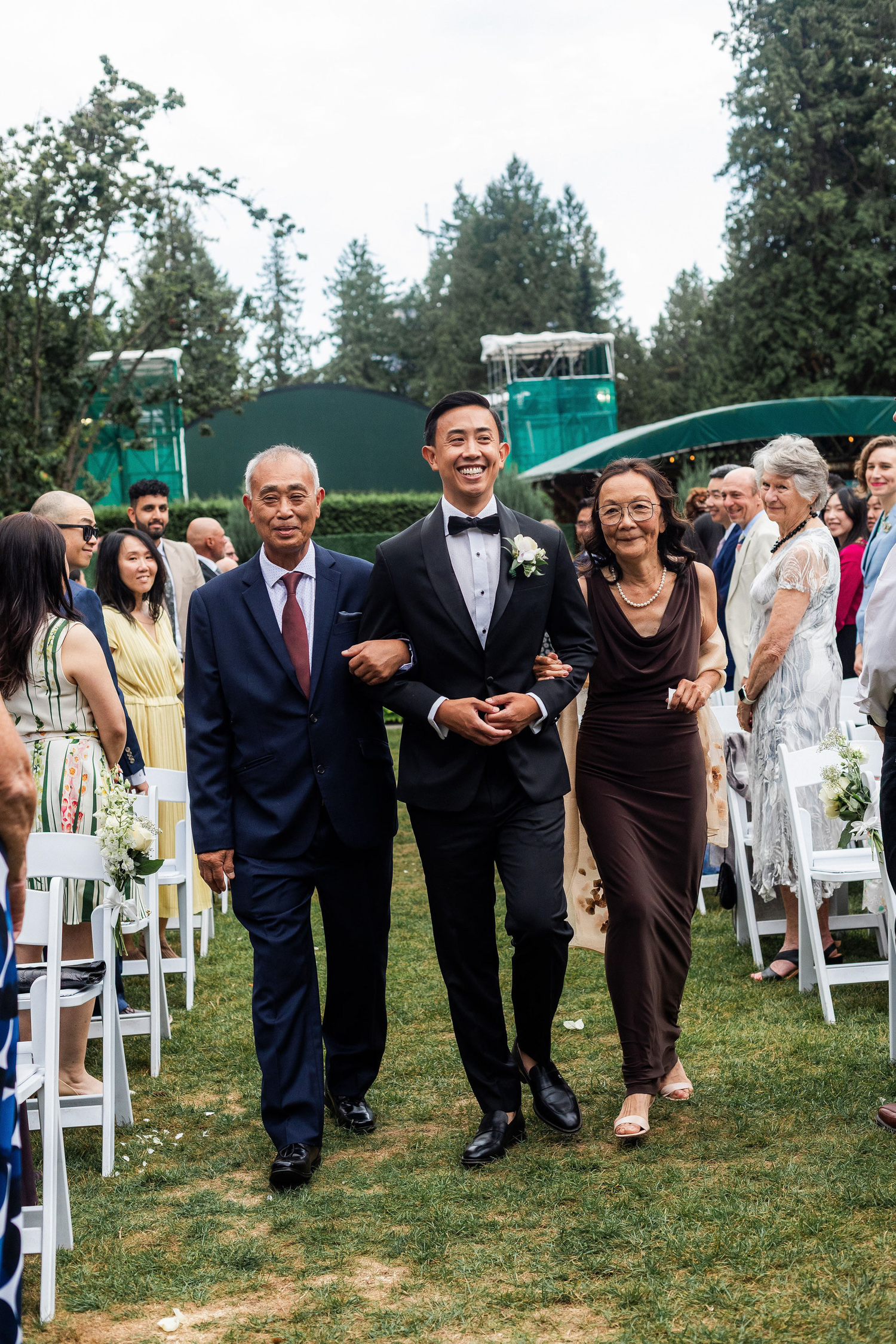 groom and parents at ceremony stanley park pavilion